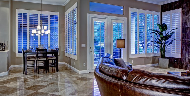 San Jose great room with white shutters and modern lighting.